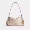 Sac bandoulière Carey en Signature Canvas