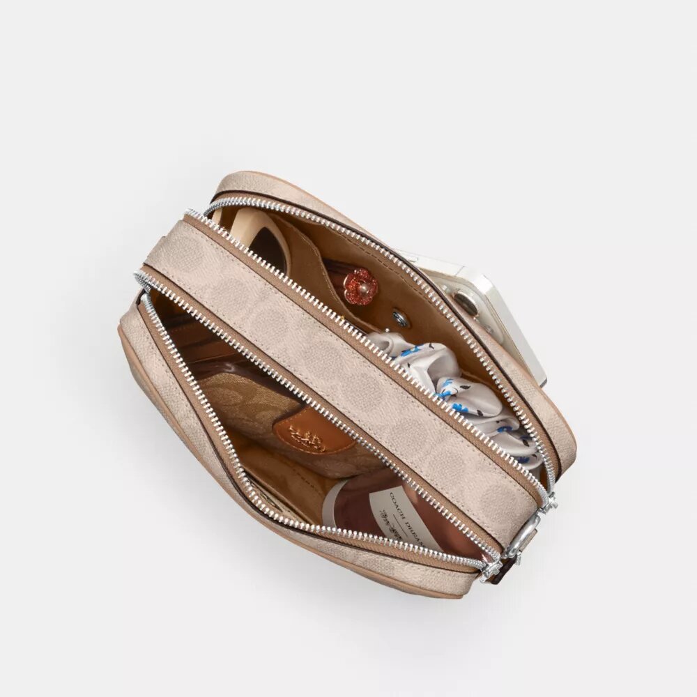 Sac bandoulière Carey en Signature Canvas