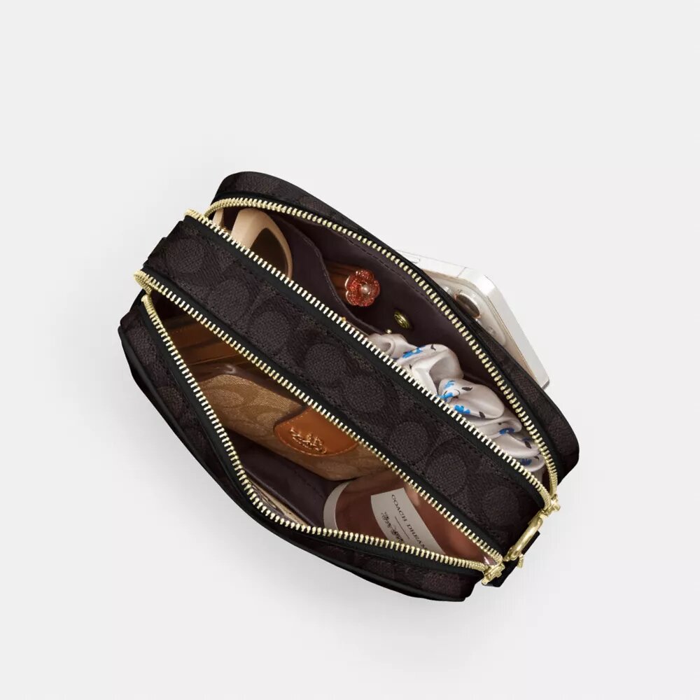 Sac bandoulière Carey en Signature Canvas
