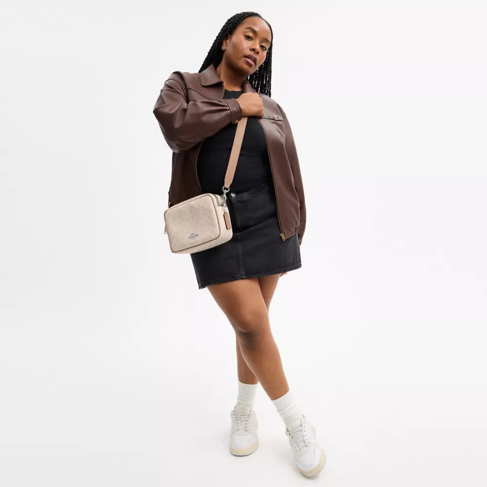 Sac bandoulière Carey en Signature Canvas