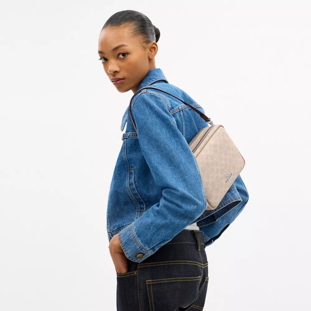 Sac bandoulière Carey en Signature Canvas
