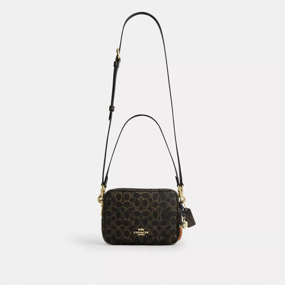 Sac bandoulière Carey en Signature Canvas avec Charms