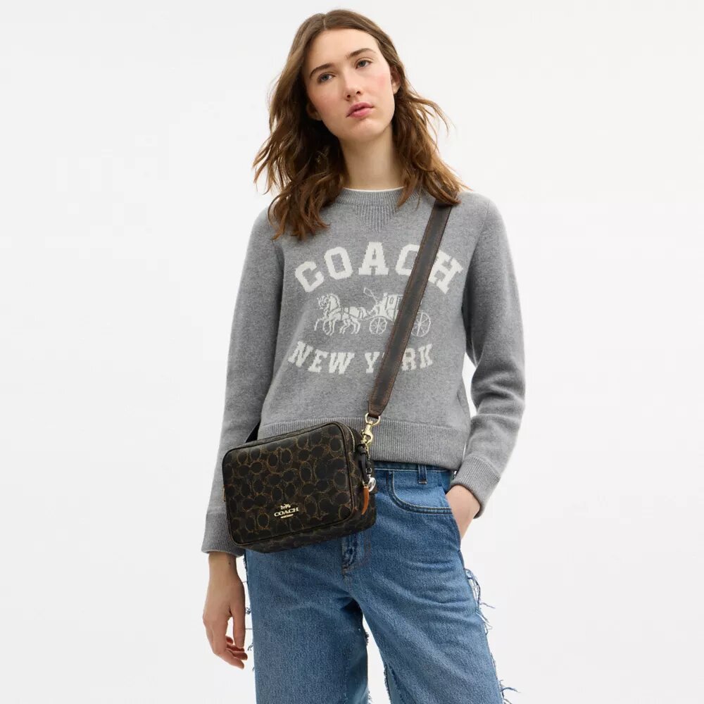 Sac bandoulière Carey en Signature Canvas avec Charms