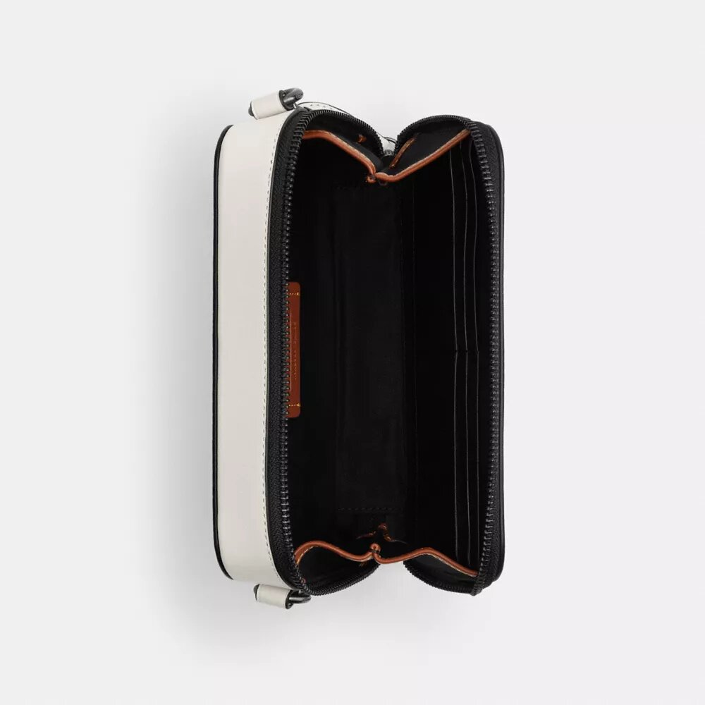 Sac bandoulière Charter Slim en Signature Canvas