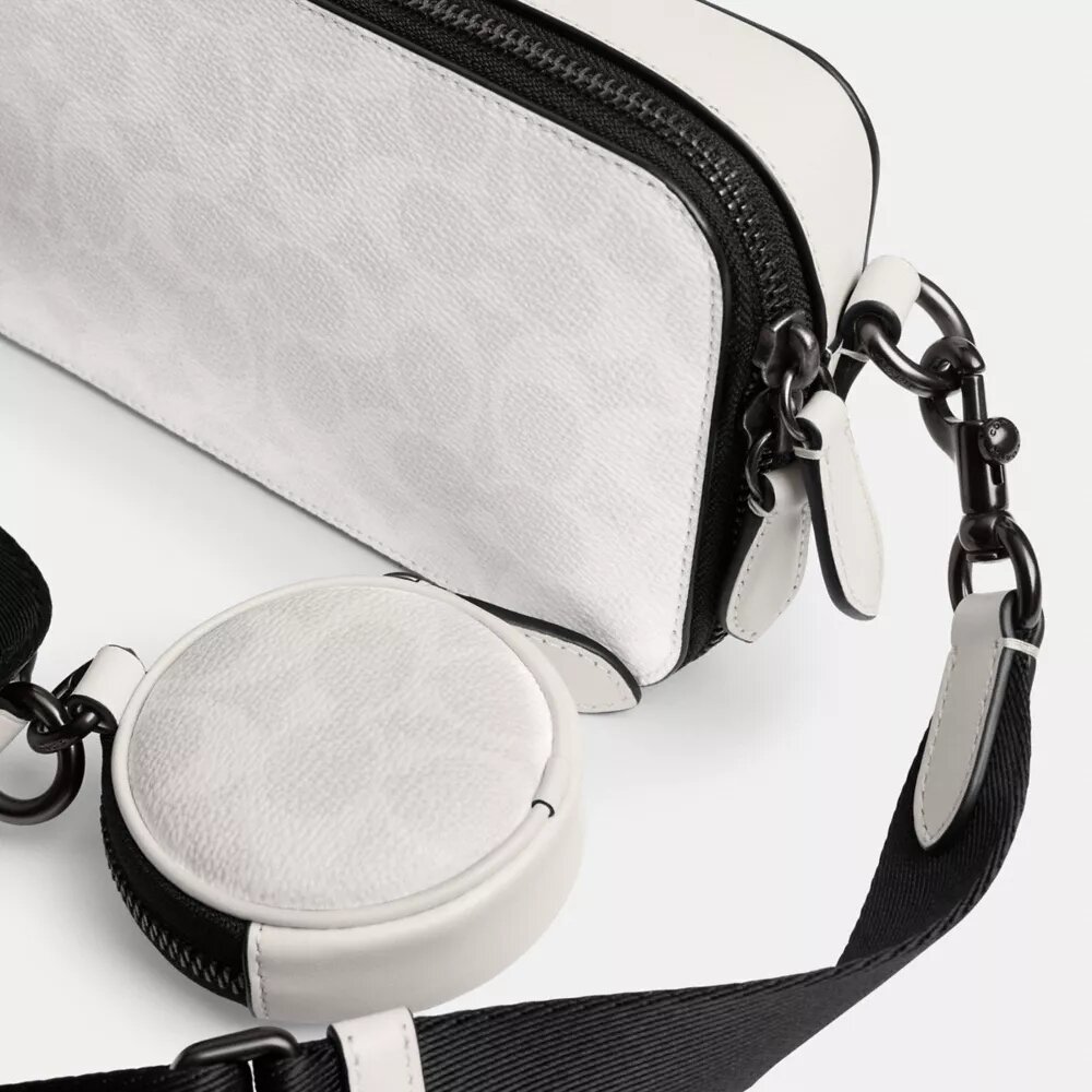 Sac bandoulière Charter Slim en Signature Canvas