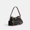 Sac bandoulière Dakota « 10e anniversaire de Rexy » en cuir patiné avec imprimé autocollants
