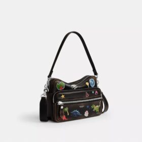 Sac bandoulière Dakota « 10e anniversaire de Rexy » en cuir patiné avec imprimé autocollants