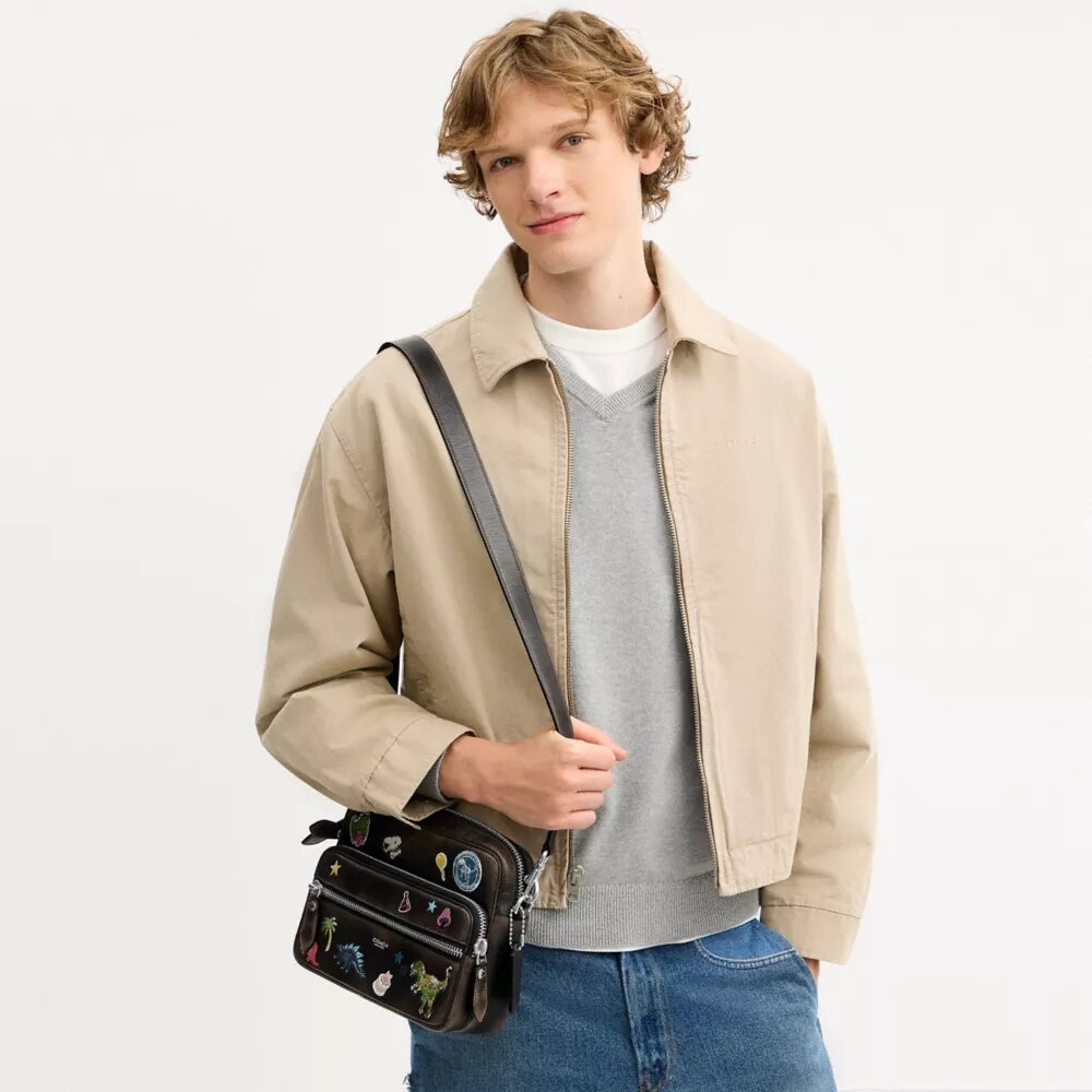 Sac bandoulière Dakota « 10e anniversaire de Rexy » en cuir patiné avec imprimé autocollants