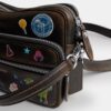 Sac bandoulière Dakota « 10e anniversaire de Rexy » en cuir patiné avec imprimé autocollants