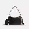 Sac bandoulière Dakota en cuir patiné avec Charms