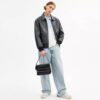 Sac bandoulière Dakota en Signature Canvas