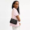 Sac bandoulière Elodie 18 en Signature Canvas