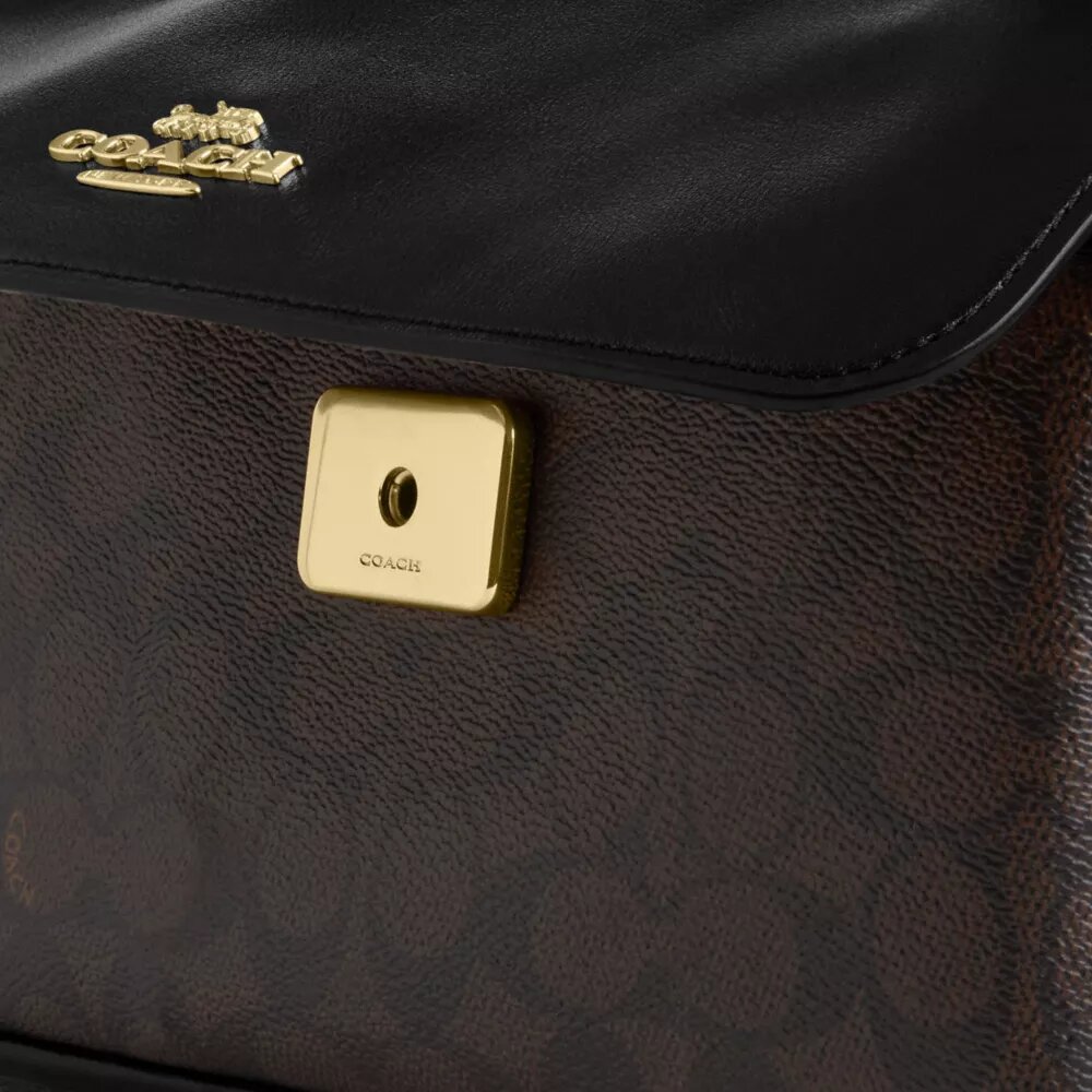 Sac à bandoulière Elodie en Signature Canvas