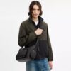 Sac bandoulière Finn avec poches en Signature Canvas