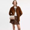 Sac bandoulière Klare en Signature Canvas