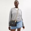 Sac bandoulière Klare en Signature Canvas
