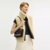 Sac bandoulière Klare en Signature Canvas