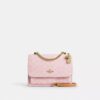 Sac à bandoulière Klare en Signature Canvas avec Charms