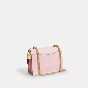 Sac à bandoulière Klare en Signature Canvas avec Charms
