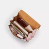 Sac à bandoulière Klare en Signature Canvas avec Charms