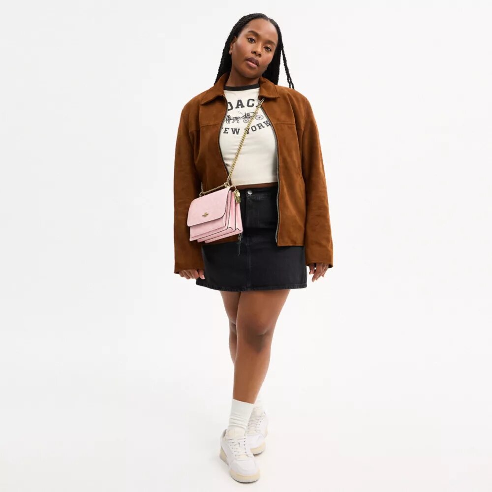 Sac à bandoulière Klare en Signature Canvas avec Charms