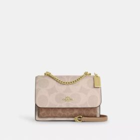 Sac bandoulière Klare en Signature Canvas à motifs géométriques