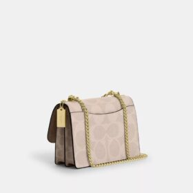 Sac bandoulière Klare en Signature Canvas à motifs géométriques
