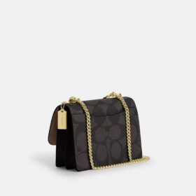 Sac bandoulière Klare en Signature Canvas à motifs géométriques
