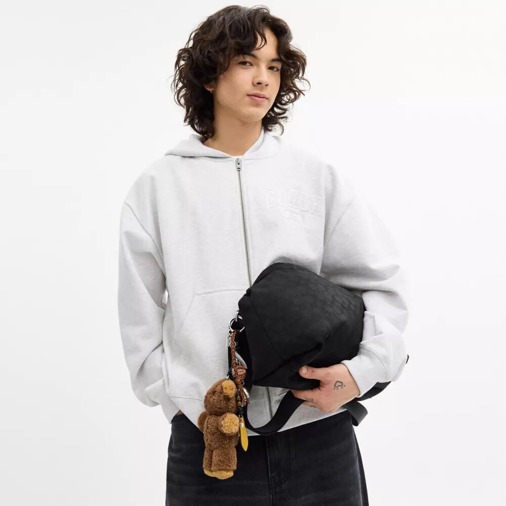 Sac à bandoulière Leo en Nylon signature avec Charms