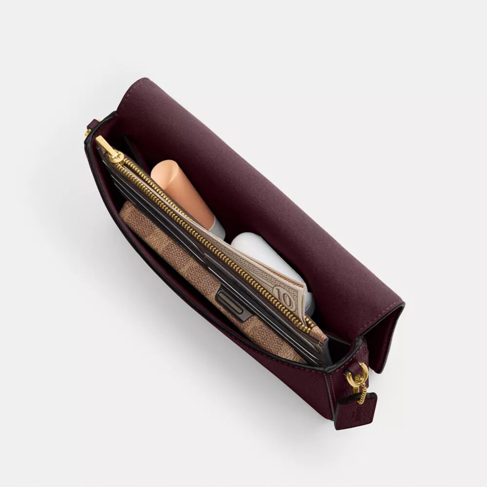 Sac à bandoulière Mila en Signature Canvas