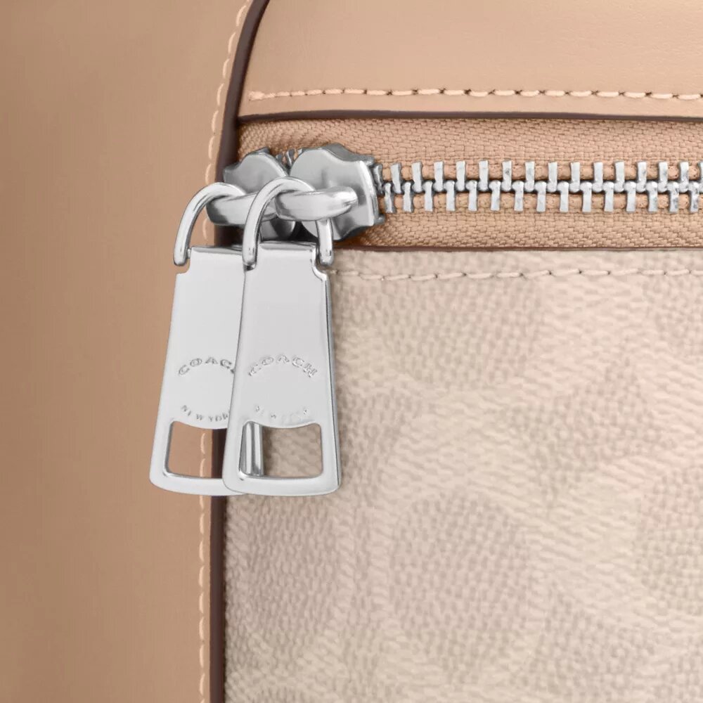 Sac à bandoulière Rainer 18 en Signature Canvas
