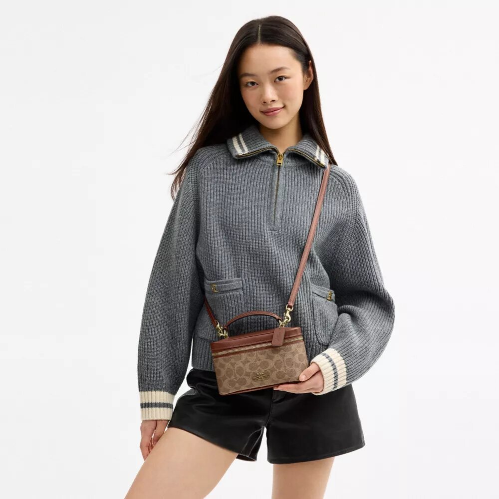 Sac à bandoulière Rainer 18 en Signature Canvas