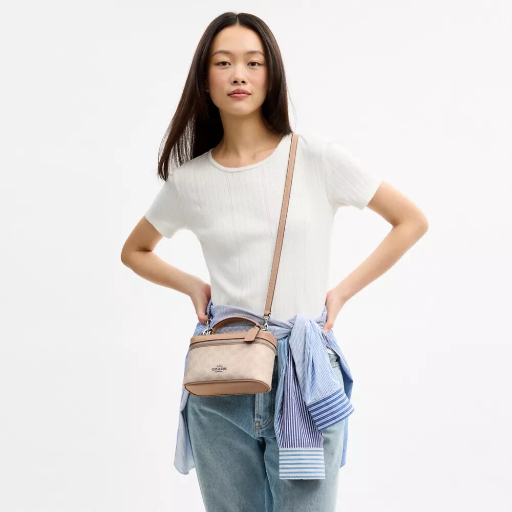 Sac à bandoulière Rainer 18 en Signature Canvas