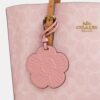 Sac cabas Mollie 25 en Signature Canvas avec Charms