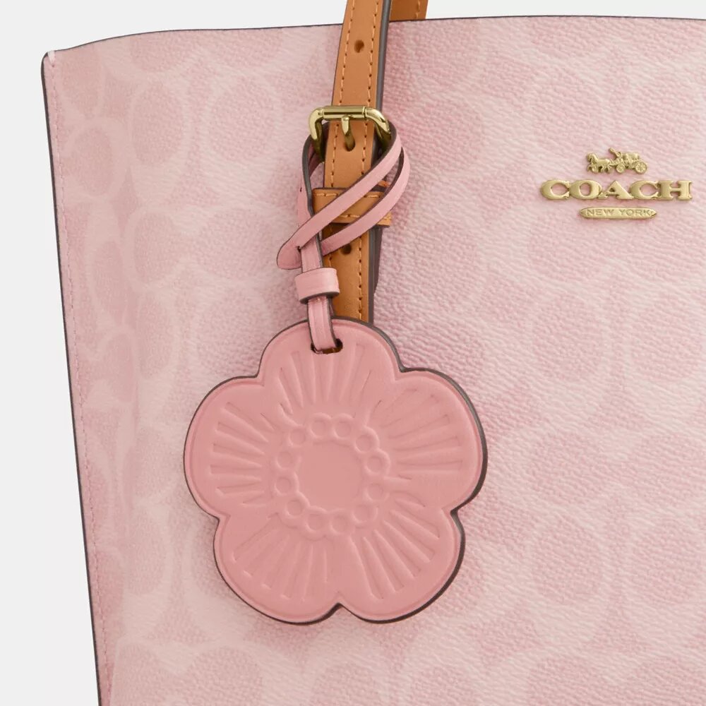 Sac cabas Mollie 25 en Signature Canvas avec Charms
