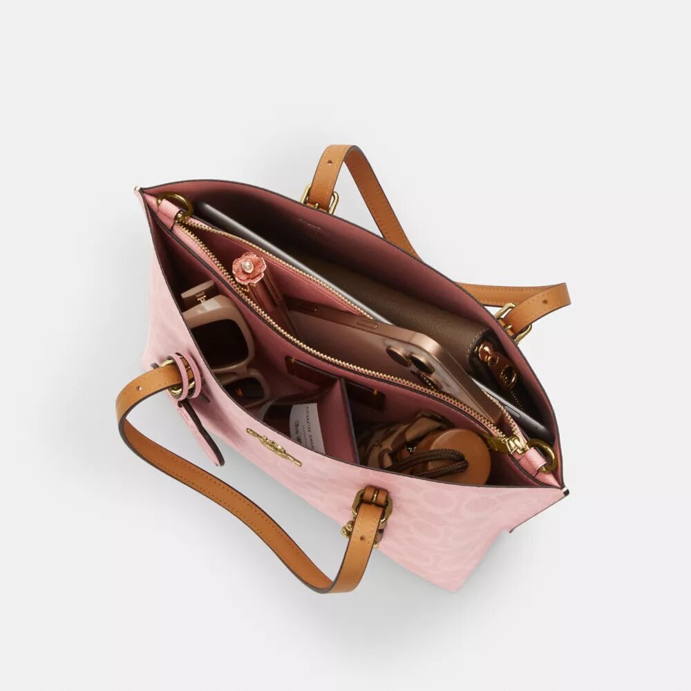 Sac cabas Mollie 25 en Signature Canvas avec Charms