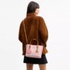 Sac cabas Mollie 25 en Signature Canvas avec Charms