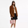 Sac cabas Mollie 25 en Signature Canvas avec Charms