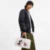 Sac Compass 35 Disney x Coach avec Mickey Mouse