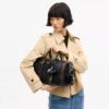 Sac Compass 35 en cuir vieilli avec Charms