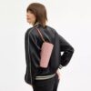 Sac cylindrique en Signature Canvas