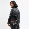 Sac Disney X Coach Rogue 25 avec Pluto