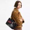 Sac Disney X Coach Rogue 25 avec Pluto