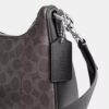 Sac hobo Nolan en Signature Canvas