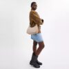 Sac hobo Teri en Signature Canvas