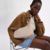 Sac hobo Teri en Signature Canvas