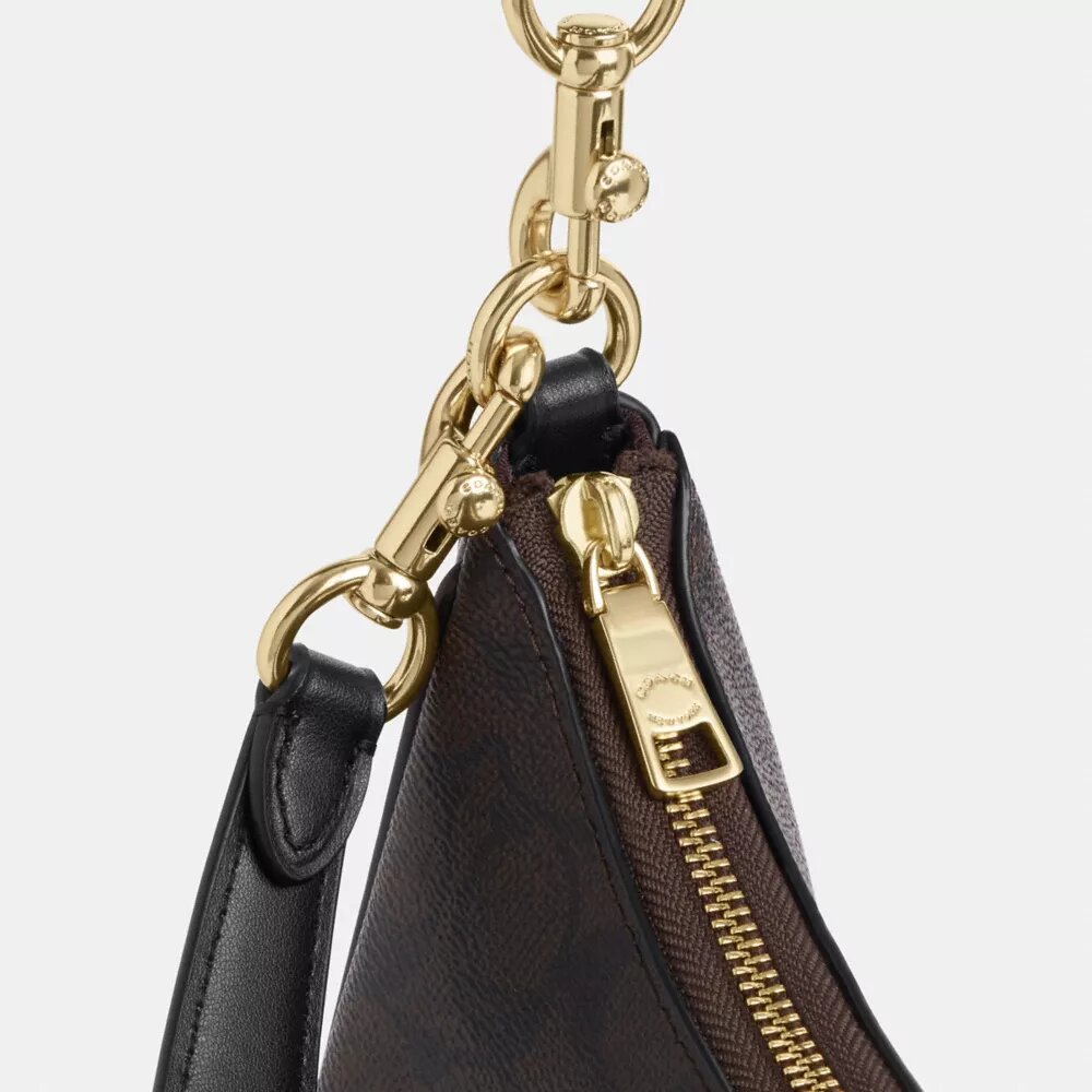 Sac hobo Teri en Signature Canvas