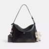 Sac messager Mott 38 en cuir patiné avec Charms