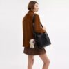 Sac messager Mott 38 en cuir patiné avec Charms