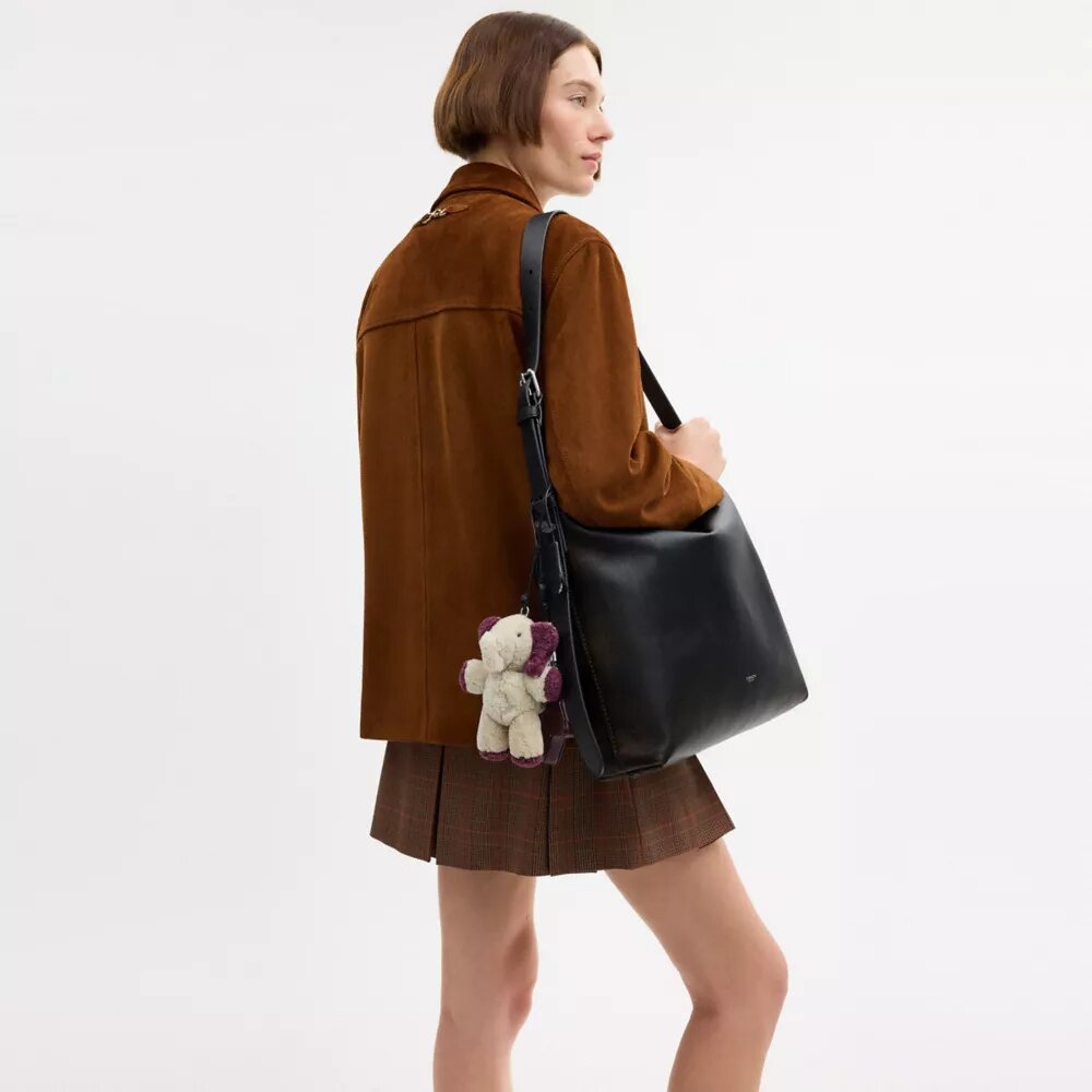 Sac messager Mott 38 en cuir patiné avec Charms